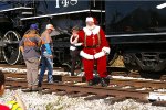 SANTA WAVING TO THE KID